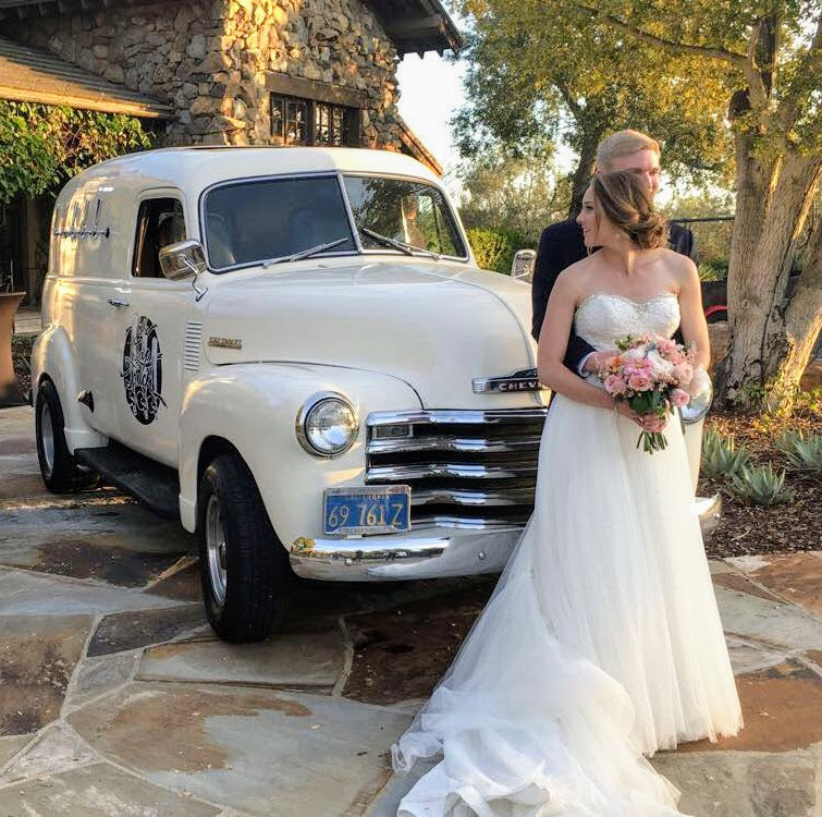 Outdoor wedding event with white Tap Truck mobile bar