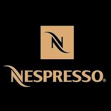 distributeur de capsule à pièce café nespresso