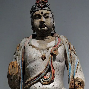 An ancient Chinese Buddha statue: Attendant Bodhisattva An ancient Chinese Buddha statue: Attendant Bodhisattva