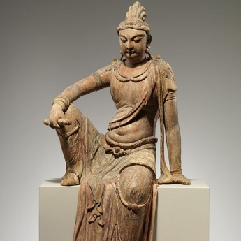 An ancient Chinese Buddha statue: Attendant Bodhisattva An ancient Chinese Buddha statue: Attendant Bodhisattva