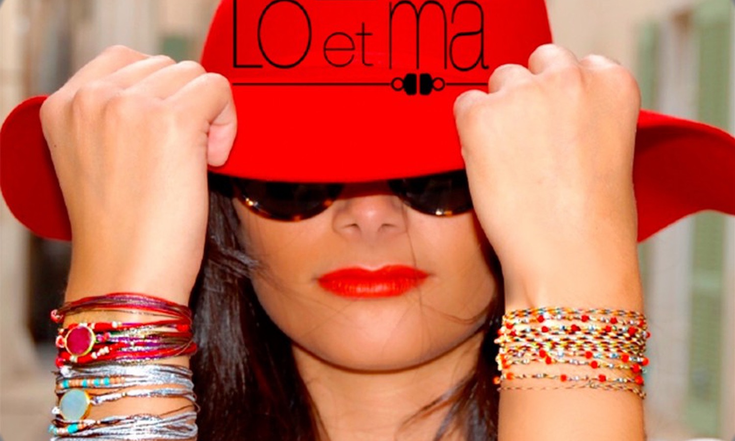 Loetma, French jewel maker French girl with a red hat and bracelets