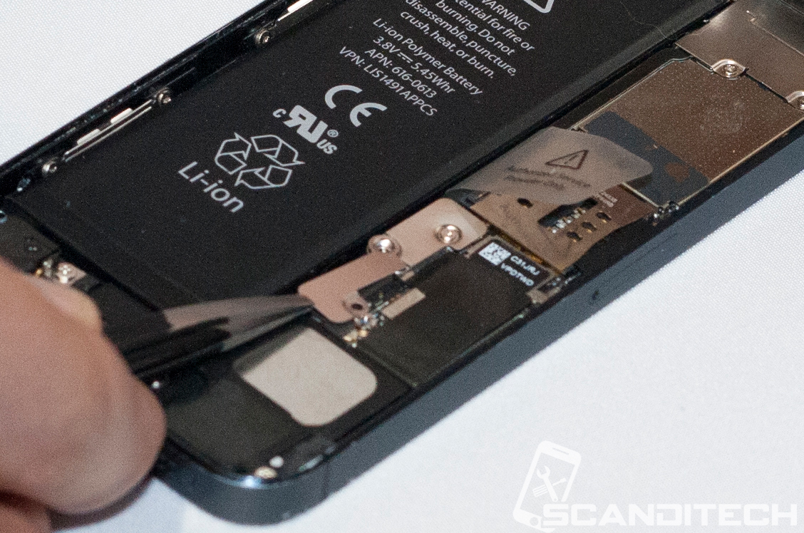 iPhone 5 battery replacement guide - Reinstalling the battery metal cover.