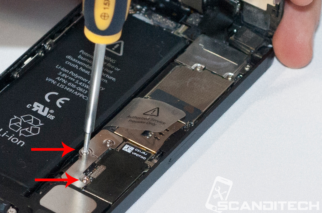 iPhone 5 battery replacement guide - Removing the battery metal cover.